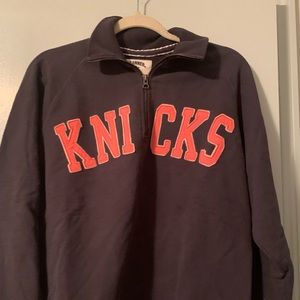 New York Knicks half zip sweatshirt.